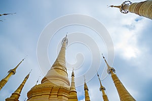 Converging spires from low point of view Pagoda in the Indein village at Inle Lake,Shan State,Myanmar