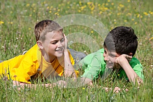 Conversation of two boys outdoors