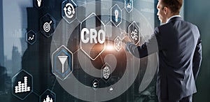 Conversion Rate Optimization. CRO Technology Finance concept Businessman pressing on a virtual screen