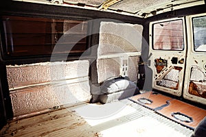 Conversion of a t4 van into a camper van. Carpeting has been added to the metalwork photo