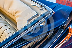 Convertible top of an old luxury automobile photo