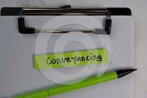 Conveyancing write on sticky notes isolated on office desk