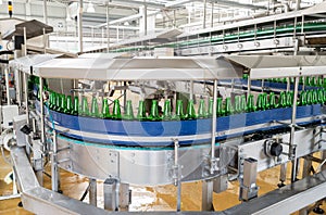 Conveyer belt with beer bottles in a brewery