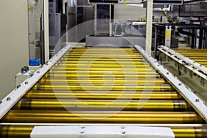 The conveyor in auto machine in manufacturing.