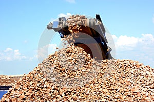 Conveyor belt on crusher photo