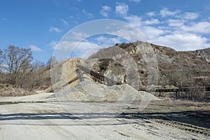 Conveyor belt at an old gravel quarry. Mining and quarrying equipment