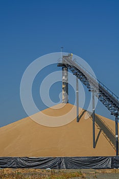 Conveyor belt used to pile massive amounts of wheat in Fenn, Idaho County, Idaho
