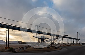 Conveyor belts of the Santa Pola salt flats in the morning after sunrise.