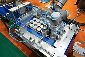 Conveyor for the production of cans in factory. closed tin cans - Canned foods industry.