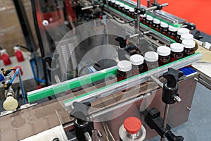 Conveyor for the production of Medicine bottle in factory. closed Medicine bottle industry.