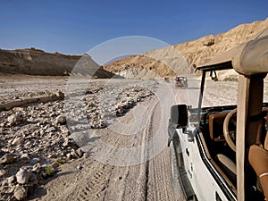 A convoy of jeeps on a journey in the desert