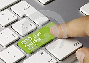 COO Chief Operating Officer - Inscription on Green Keyboard Key