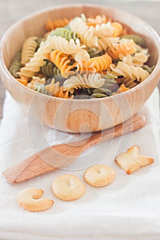 Cook alphabet biscuit with fusili pasta
