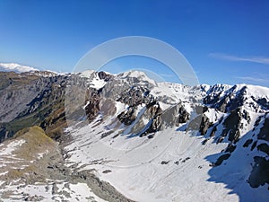 Cook Alps southern island mountain top view with blue sky background