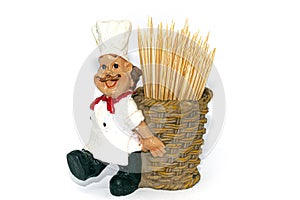 A cook with a basket full of toothpicks for the kitchen