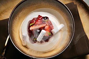 Cook chef making fruit ice cream added liquid nitrogen