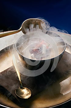 Cook chef making fruit ice cream added liquid nitrogen