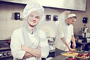 Cook chef Portrait in restaurant kitchen