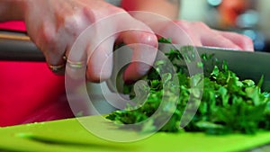 Cook chopping parsley