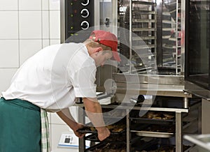 Cook at commercial stove