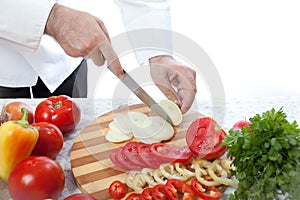 Cook cutting onion