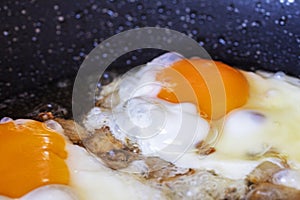 fried eggs with bacon for breakfast