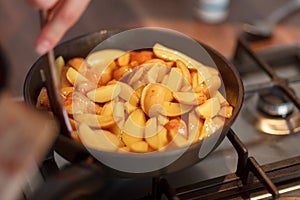 Cook frying new potatoes