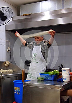 Hand pulled noodles in Chinese restaurant kitchen