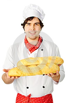 Cook holding couple breads