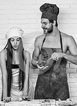 Cook master class. Man and girl on kitchen