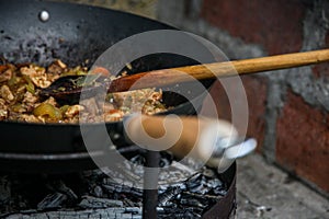 The cook prepares food in natur photo