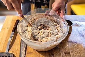 Cook stirring wheat flour with gluten to prepare a bread