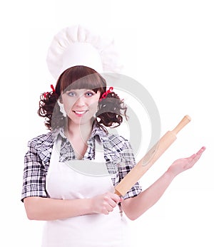 Cook woman holds a kitchen wood utensil