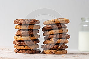 Stacked chocolate cookies with white background photo