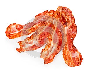 Cooked bacon rashers close-up isolated on a white background photo
