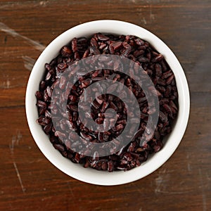 Cooked black rice in bowl