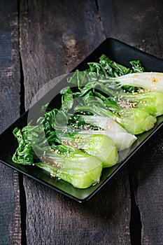 Cooked bok choy with sesame seeds