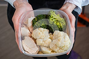 Cooked broccoli and cauliflower in hend