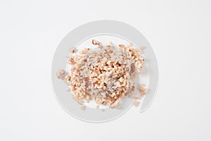 Cooked brown rice on white table