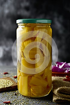 Cooked cardoon in a glass jar photo