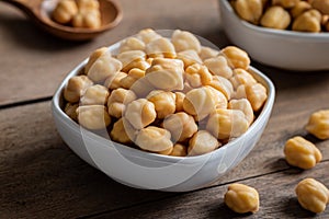 Cooked chick peas in white bowl
