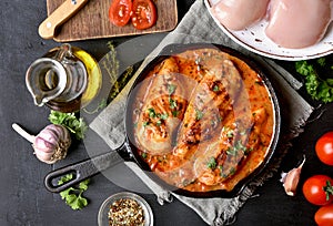 Cooked chicken breast with tomato sauce