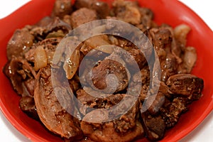cooked chicken livers, gizzards and hearts, selective focus of fresh liver, gizzard and heart of chickens full of protein in a