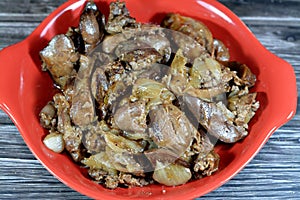 cooked chicken livers, gizzards and hearts, selective focus of fresh liver, gizzard and heart of chickens full of protein in a