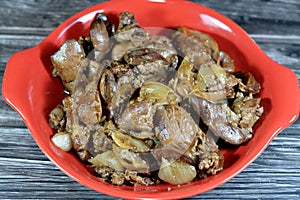 cooked chicken livers, gizzards and hearts, selective focus of fresh liver, gizzard and heart of chickens full of protein in a