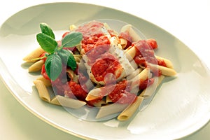 Cooked cod loins with tomato sauce