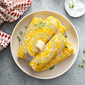 Cooked corn on the cob with salt and butter