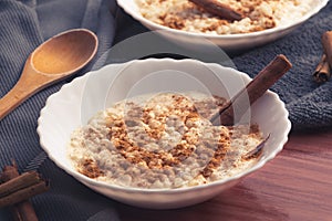 Cooked creamy rice pudding with cinnamon