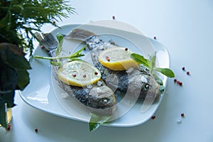 Cooked fish with lemon