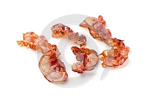 Cooked fried slices of bacon isolated